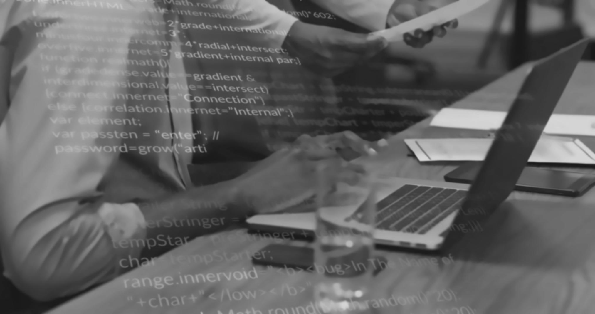 Modern workspace showing collaborative dApp development process with multiple monitors displaying code and blockchain interfaces